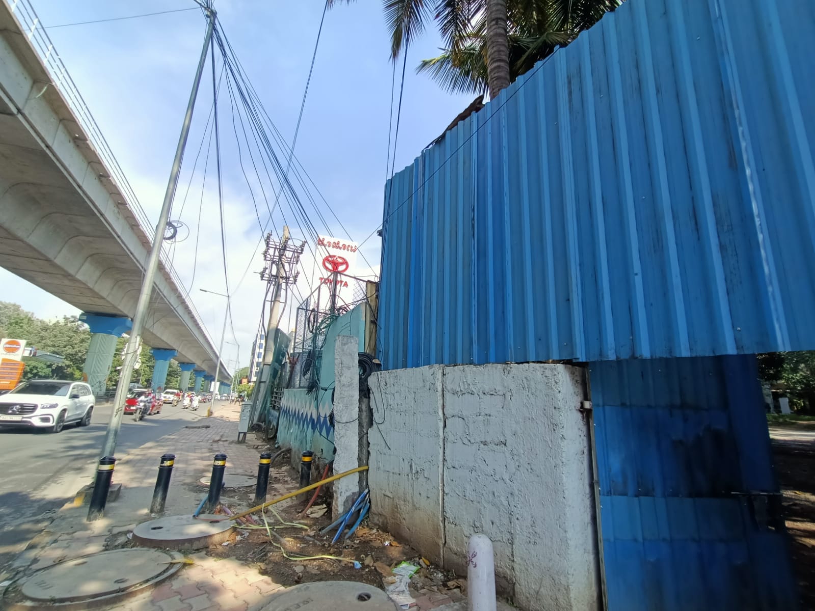 Boundary edge beside the road and elevated infrastructure