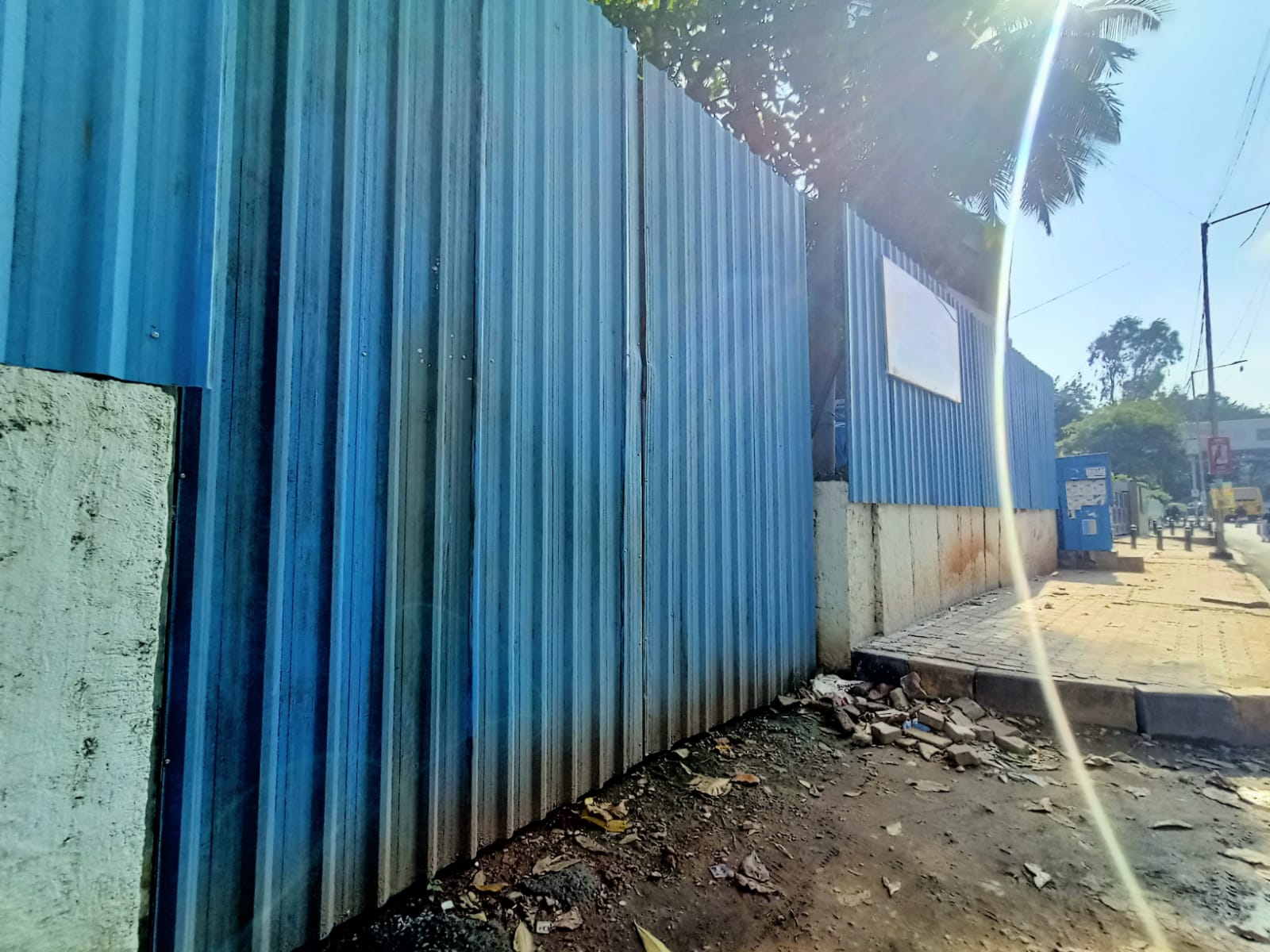 Roadside boundary fencing and footpath